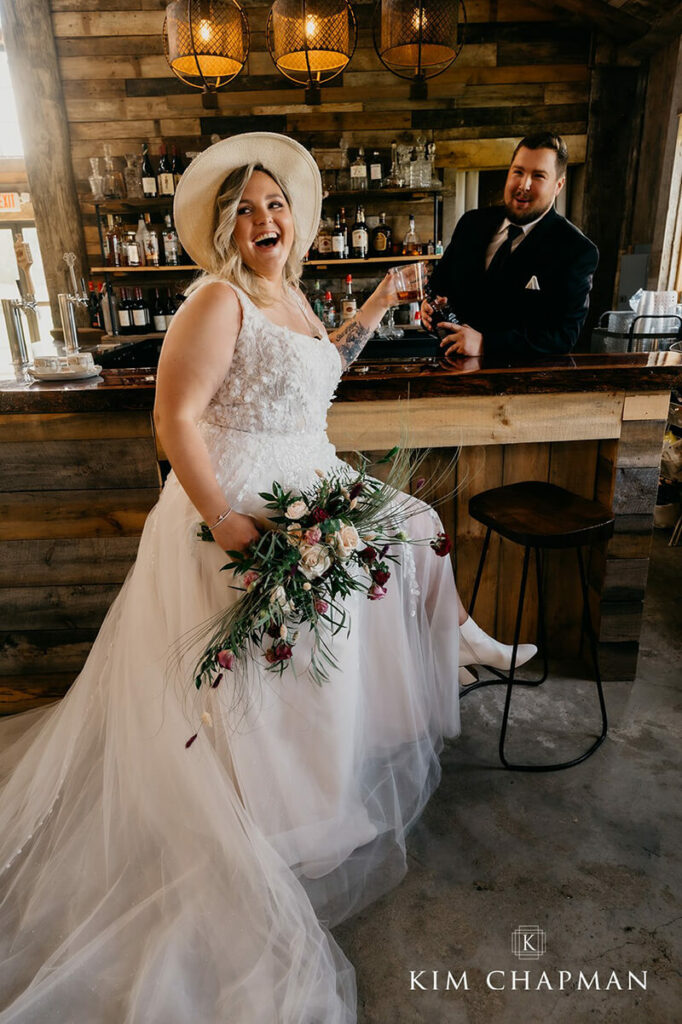 Bride and Groom celebrating at the bar